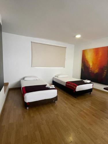 Standard Quadruple Room room in Ayenda Apartamento Turistico Distrito 9 90