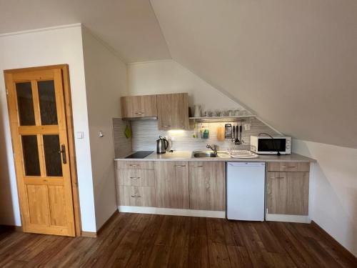 ห้องครัว, Apartment Brusinka in คาสเปอร์สเกโฮรี