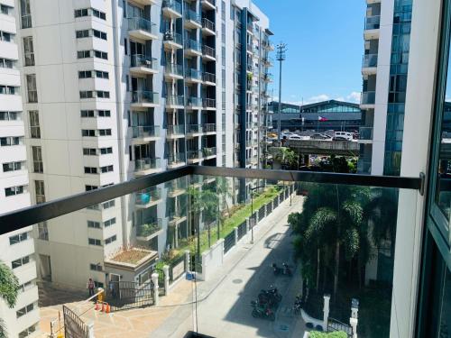 One Palm Tree Villas Condominium - Studio 5M with Balcony - Across Terminal 3 Airport One Palm Tree Villas Condominium - Studio 5M with Balcony - Across Terminal 3 Airport