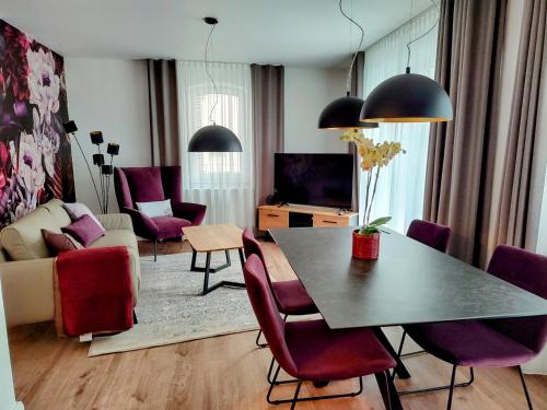 ห้องส่วนกลางสำหรับนั่งเล่น/ดูทีวี, Ferienwohnungen am Wasserfall in บาด อัวราค