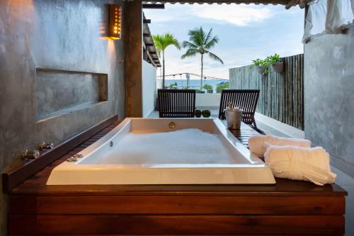 อ่างแช่น้ำร้อน, Pousada Bahia Bacana in มอร์โร เดอซาโอ พอโล