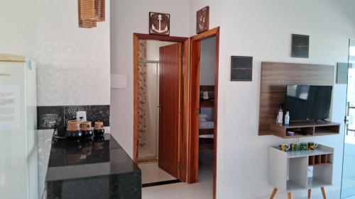 Casa com piscina e espaço gourmet a 30m da praia! (Casa com piscina e espaco gourmet a 30m da praia!) in Alkobaka