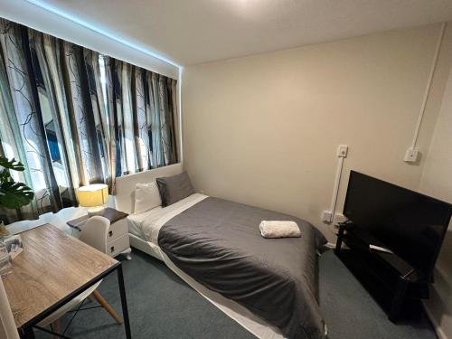 Single Room with Shared Shower and Toilet