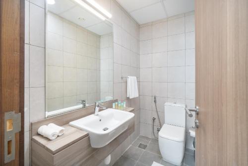 Trinity Holiday Homes - Spacious Modern Living 1BR & 2BR Unique Apartment - image 10