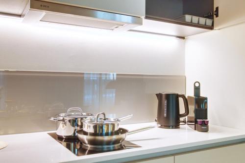 廚房, VB Boutique Apartment - Studio in belebtem Viertel nah zur Messe in 古特魯維爾特