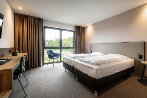 i - PARK Hotel Reichenberg 7.2km von Kleinrinderfeld entfernt