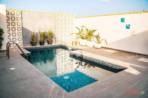 A beautiful farmhouse with a rooftop pool