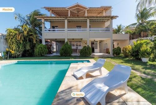 Triplex com piscina no Porto das Dunas Tactu