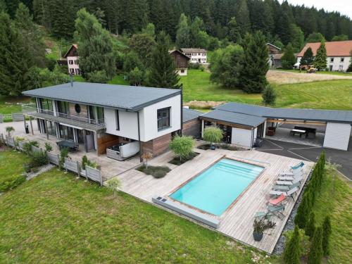 Villa 4 Saisons, avec piscine chauffée et jacuzzi - Location, gîte - Gérardmer