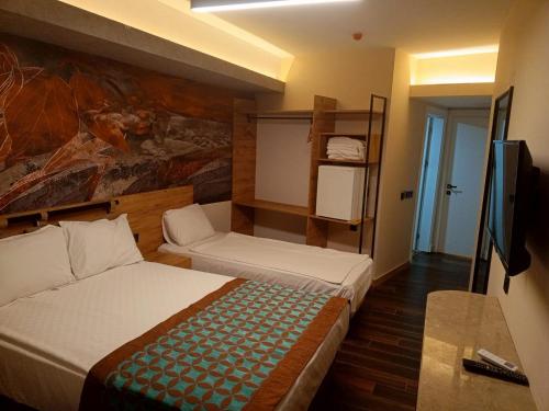 Quadruple Room room in LUPO LIBERO HOTEL SPA