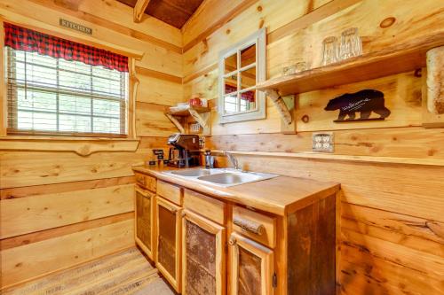 Peaceful Creekside Hideout Cabin with Hot Tub! - image 12