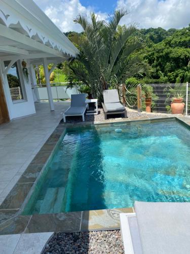 Les Appart villa Sunbay Caraibes avec piscine privative vue mer et montagne - Location saisonnière - Le François