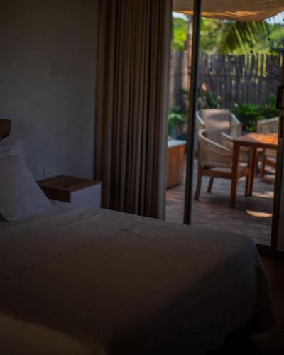 HABITACION TIPO CABAÑA CON BALCON EN ISLA DE TIERRA BOMBA CON DESAYUNO AIRE ACONDICIONADO Y WIFi