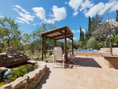 Mas Blauet - Finca with 2 holiday houses and shared pool in Rasquera