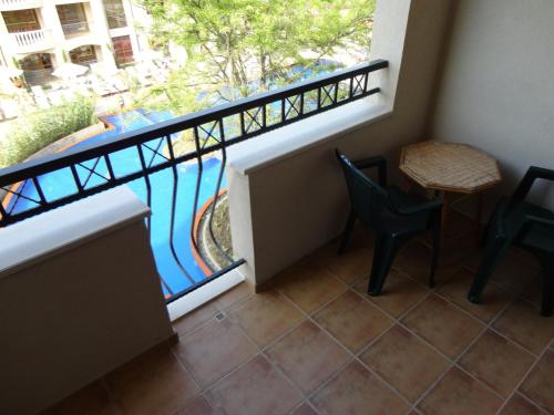 One-Bedroom Apartment with Balcony and Pool View image 10