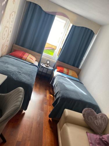 Ruhiges Zimmer im Gasthaus 3.8km von Stadthalle entfernt