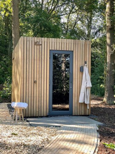  NIEUW Eco design bosvilla met sauna en xl tuin in Wateren