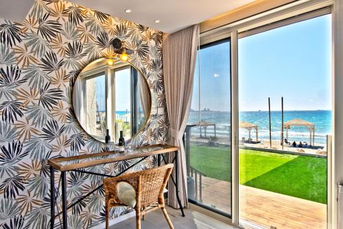 בית חוף מושלם עם גקוזי ומרפסת - Beachside Bliss W jacuzzi, Haifa (fotografie 9)