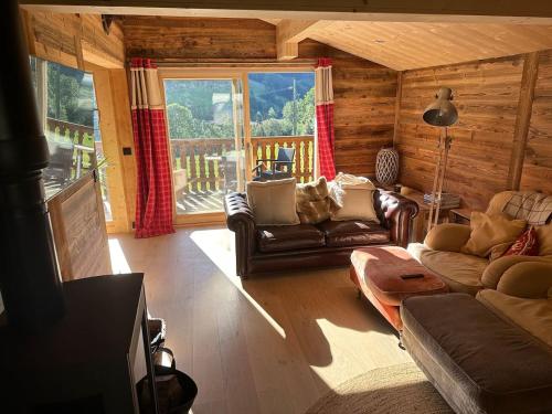 Shared lounge/TV area, Chalet Flobelle in Entremont