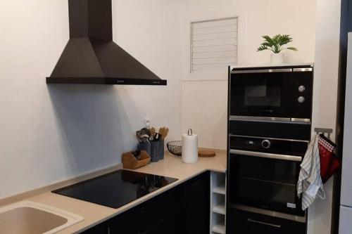 Appartement O Ti Kolibri, cosy et idéalement situé Appartement O Ti Kolibri, cosy et idéalement situé