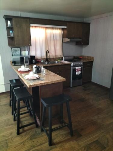Kitchen, Adanesne Apartments in Valle Dorado