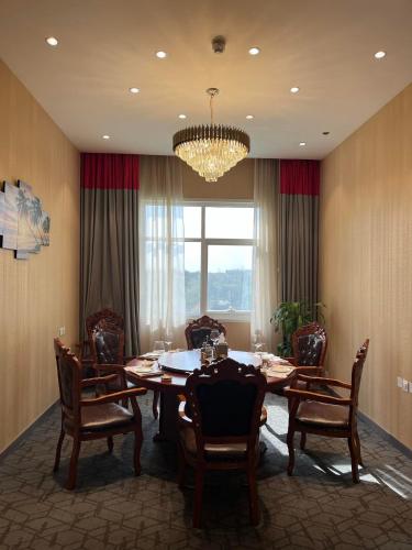 Restaurant, Peony Hotel near Nmc Hospital
