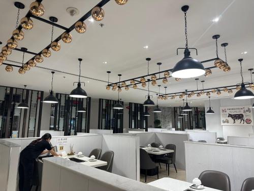 Restaurant, Peony Hotel near Nmc Hospital