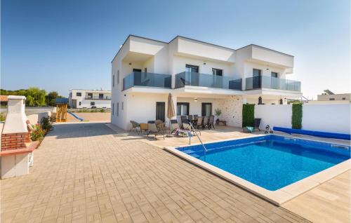Beautiful Home In Pula With Outdoor Swimming Pool, Heated Swimming Pool And 3 Bedrooms