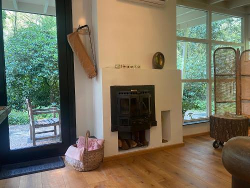 Ecolodge Bergzicht de Specht Luxe boshuis in เฟอร์สไพรเดอ เฮาเชน โลเคมเซเวค