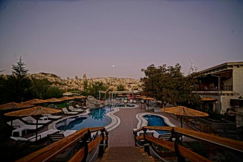 Holiday Cave Hotel - Tap to explore photos