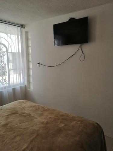 1 Cuarto confortable en la zona de Angelópolis. in Tlaxcalancingo, Mexico