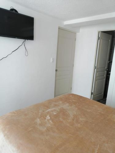 1 Cuarto confortable en la zona de Angelópolis. in Tlaxcalancingo, Mexico