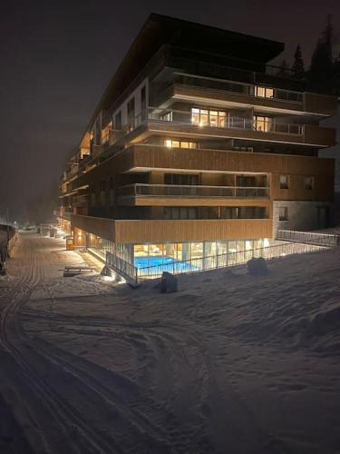 Appartement Haute gamme ski aux pieds, piscine, sauna.