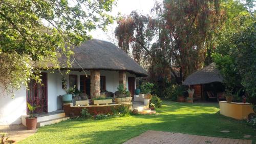 Harties Lodge - Rose Cottage - Tap to explore photos