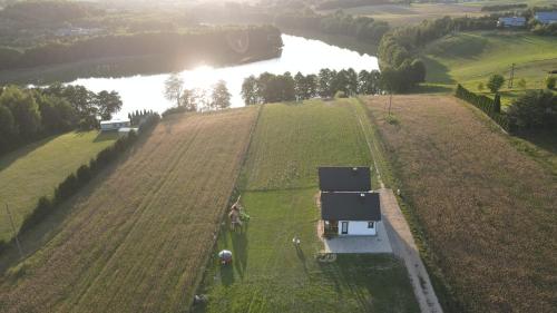 Agroturystyka '' U Adasia i Marysi '' - Domek nad jeziorem in Olpuch