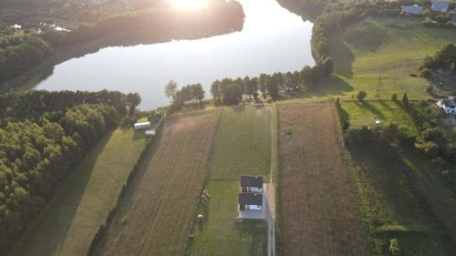 Agroturystyka '' U Adasia i Marysi '' - Domek nad jeziorem in Olpuch