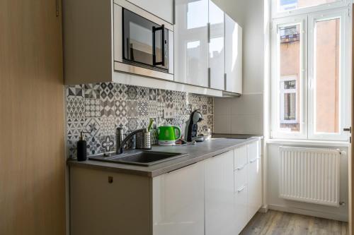 Glam Downtown Apartments - image 13