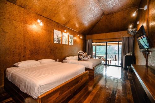 ธารามนตรา รีสอร์ท (Taramontra resort) in Si Sawat