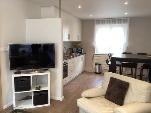 Koplietošanas atpūtas telpa ar TV, Appartement élégant idéal pour 2 personnes (Appartement elegant ideal pour 2 personnes) in Gunstett