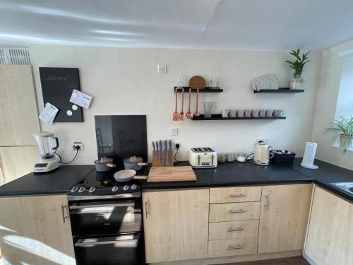 廚房, Honeycomb Cottage in 紐堡