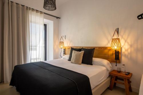 Quadruple Room with Balcony room in Hostal Boutique Es Menut