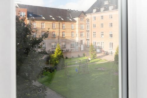 Garden, 5 min fra banegarden - plads til 4-personer in Ogadekvarteret