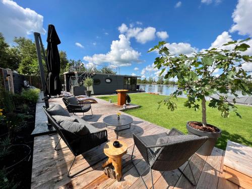 NEW - Little Asia - Stunning Boathouse on a lake Near Amsterdam with Sauna, Vinkeveen (photo 8)