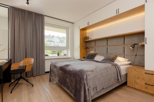 Warsaw Piaseczno Stylish Apartment by Noclegi Renters in Пясечно