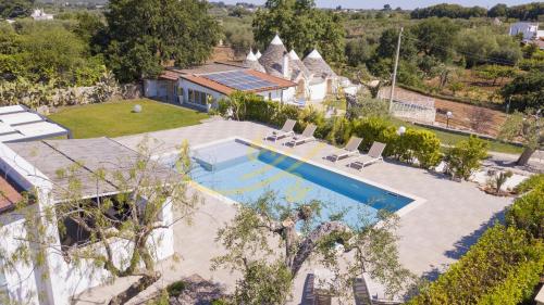  Trulli&Dimore- Trulli DoRo, Pension in Castellana Grotte