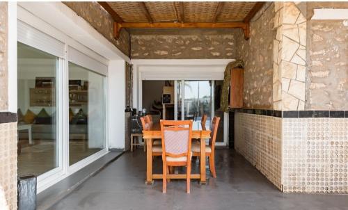 Gite equestre Balade plage petit dejeuner au bord de la piscine in Azemmour