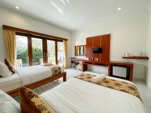 Uluwatu Cottages - Tap to explore photos