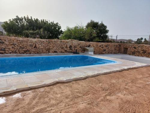 Encantadora casita con molino y piscina