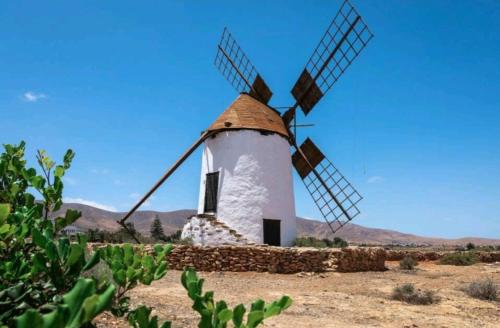 Encantadora casita con molino y piscina