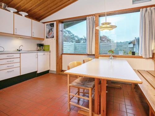 6 person holiday home on a holiday park in Gilleleje
